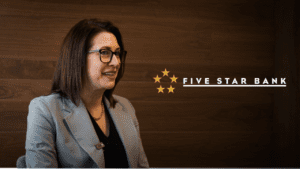 "We Don't Carry Any Dead Weight" — Inside Five Star Bank's Financial Engine with CFO Heather Luck (Part 2) 5 Heather Luck, EVP and Chief Financial Officer at Five Star Bank, sits down with Travillian's Amber Buker for an on-location, documentary-style interview filmed inside Five Star Bank.